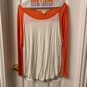 Orange and white scoop neck t-shirt.